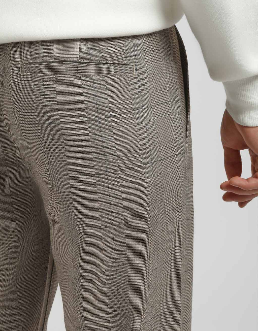 Pantaloni chino con fantasia a quadri