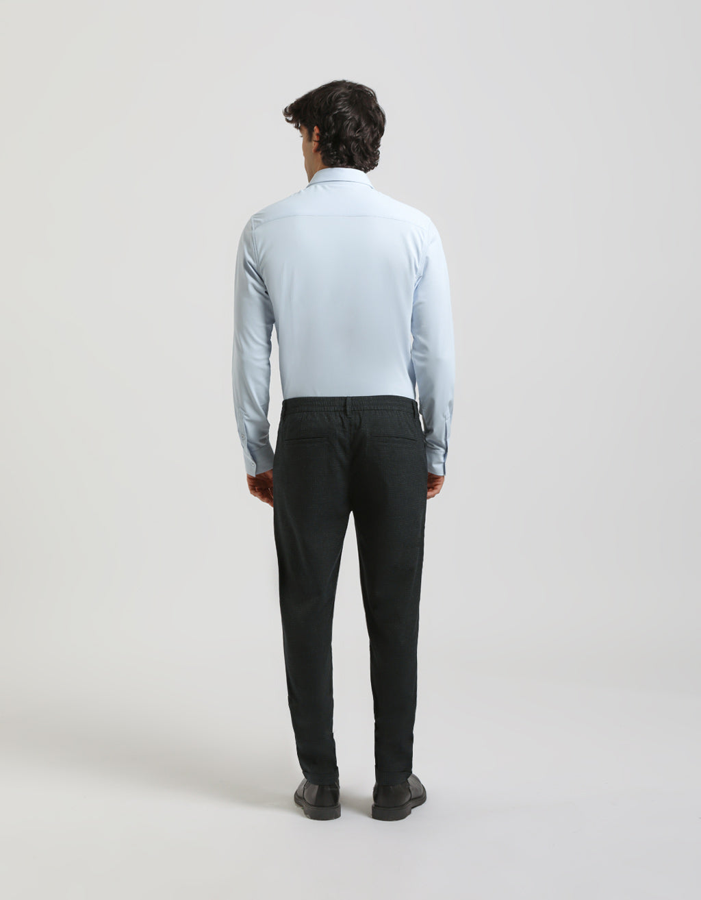 Pantaloni chino con fantasia a quadri