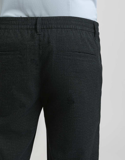 Pantaloni chino con fantasia a quadri