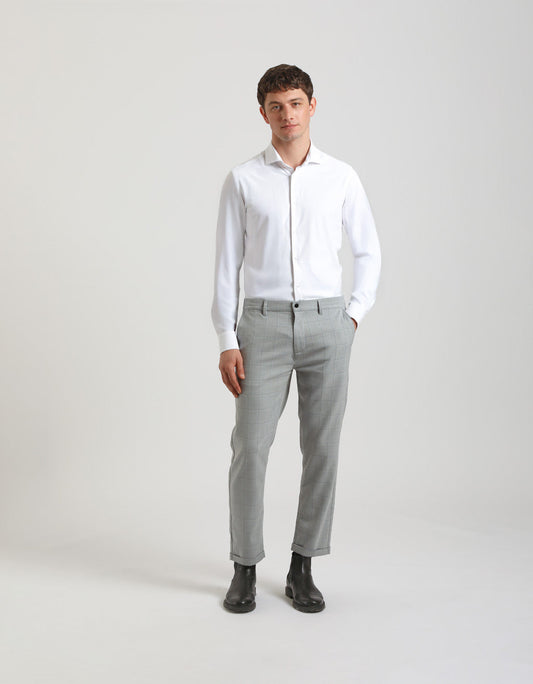 Pantaloni chino con fantasia a quadri