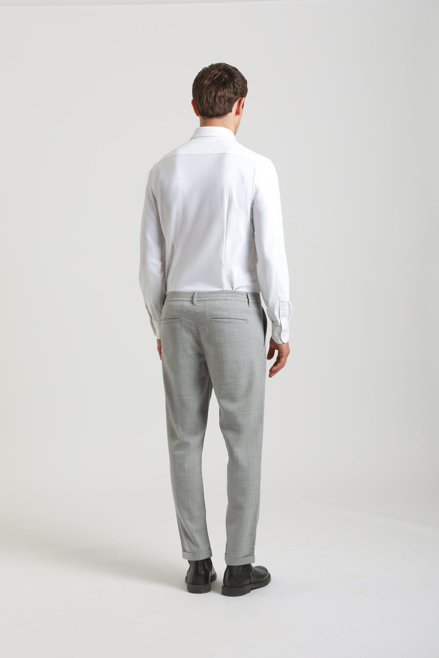 Pantaloni chino con fantasia a quadri