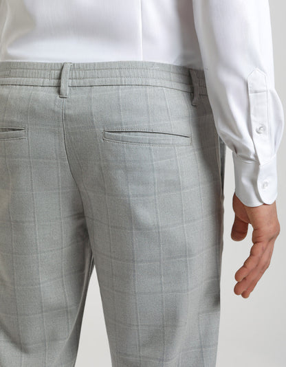 Pantaloni chino con fantasia a quadri