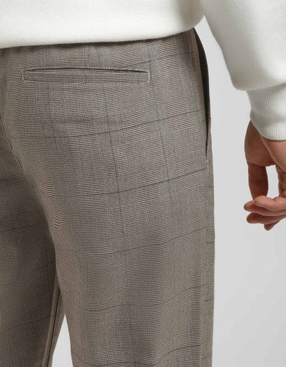 Pantaloni chino con fantasia a quadri