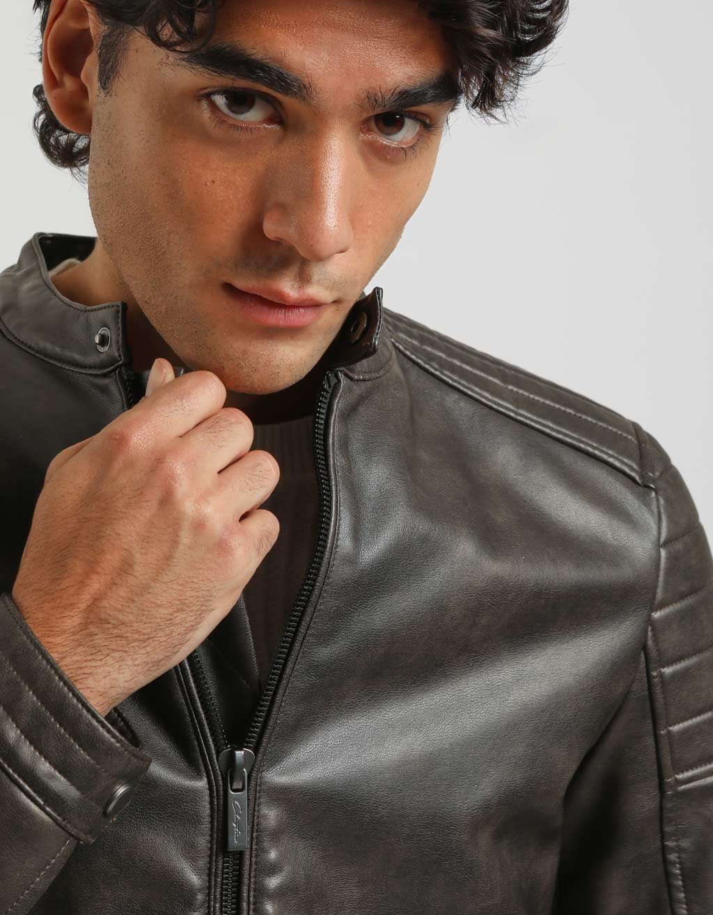 Giubbotto ecopelle effetto marmorizzato