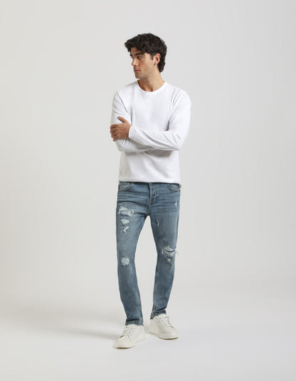 Jeans regular fit con strappi