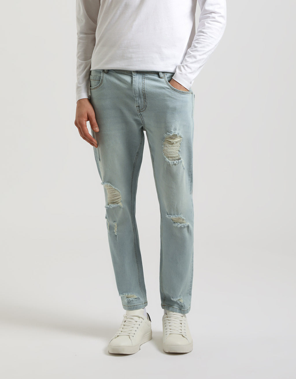 Jeans regular fit con strappi