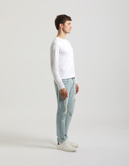 Jeans regular fit con strappi