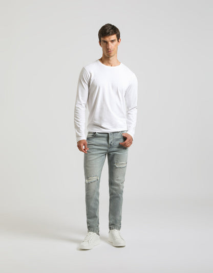 Jeans skinny fit con strappi