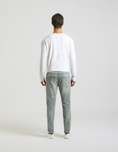 Jeans skinny fit con strappi