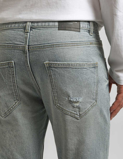 Jeans skinny fit con strappi