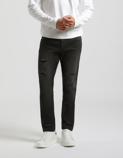 Jeans skinny fit con strappi nero