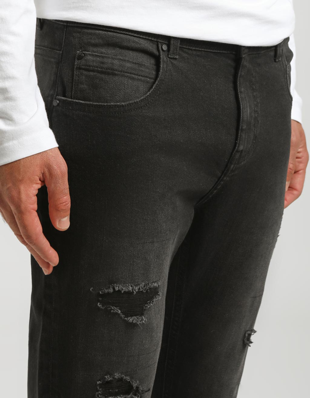 Jeans skinny fit con strappi nero