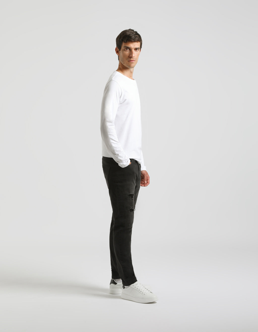 Jeans skinny fit con strappi nero