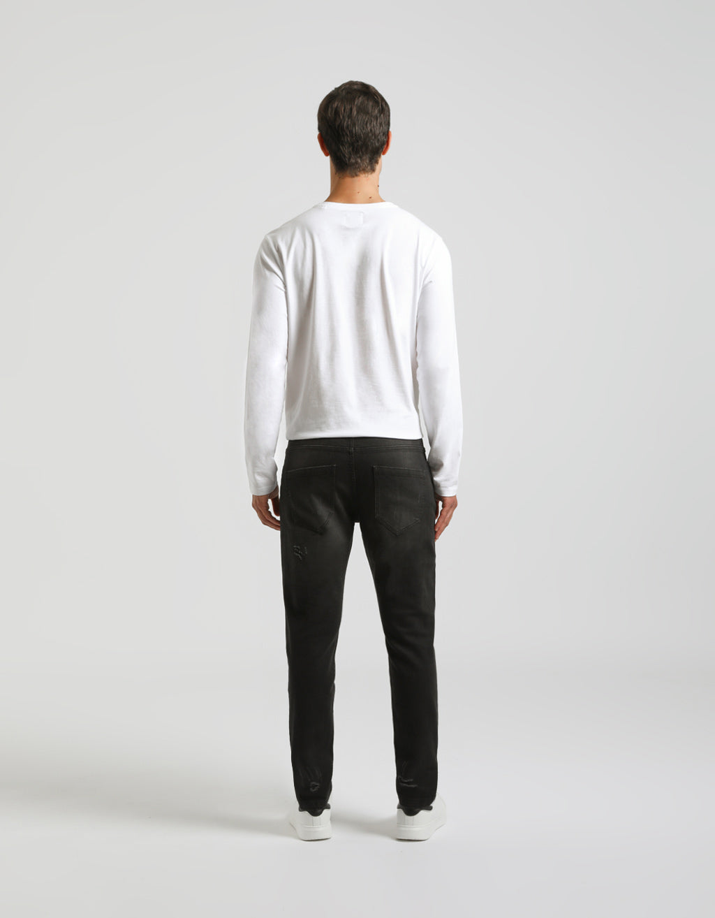 Jeans skinny fit con strappi nero